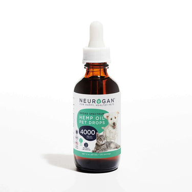 A bottle of CBD Pet oil 4000mg in a 2oz amber bottle, white dropper top and a label featuring a dog and cat