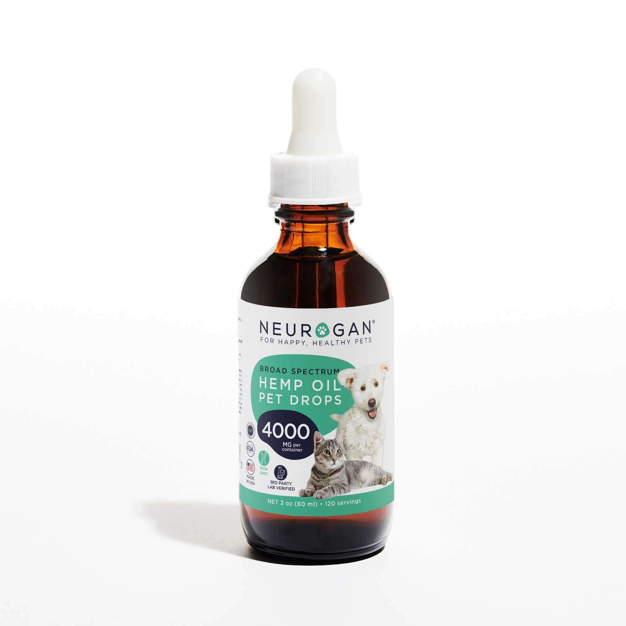 A bottle of CBD Pet oil 4000mg in a 2oz amber bottle, white dropper top and a label featuring a dog and cat